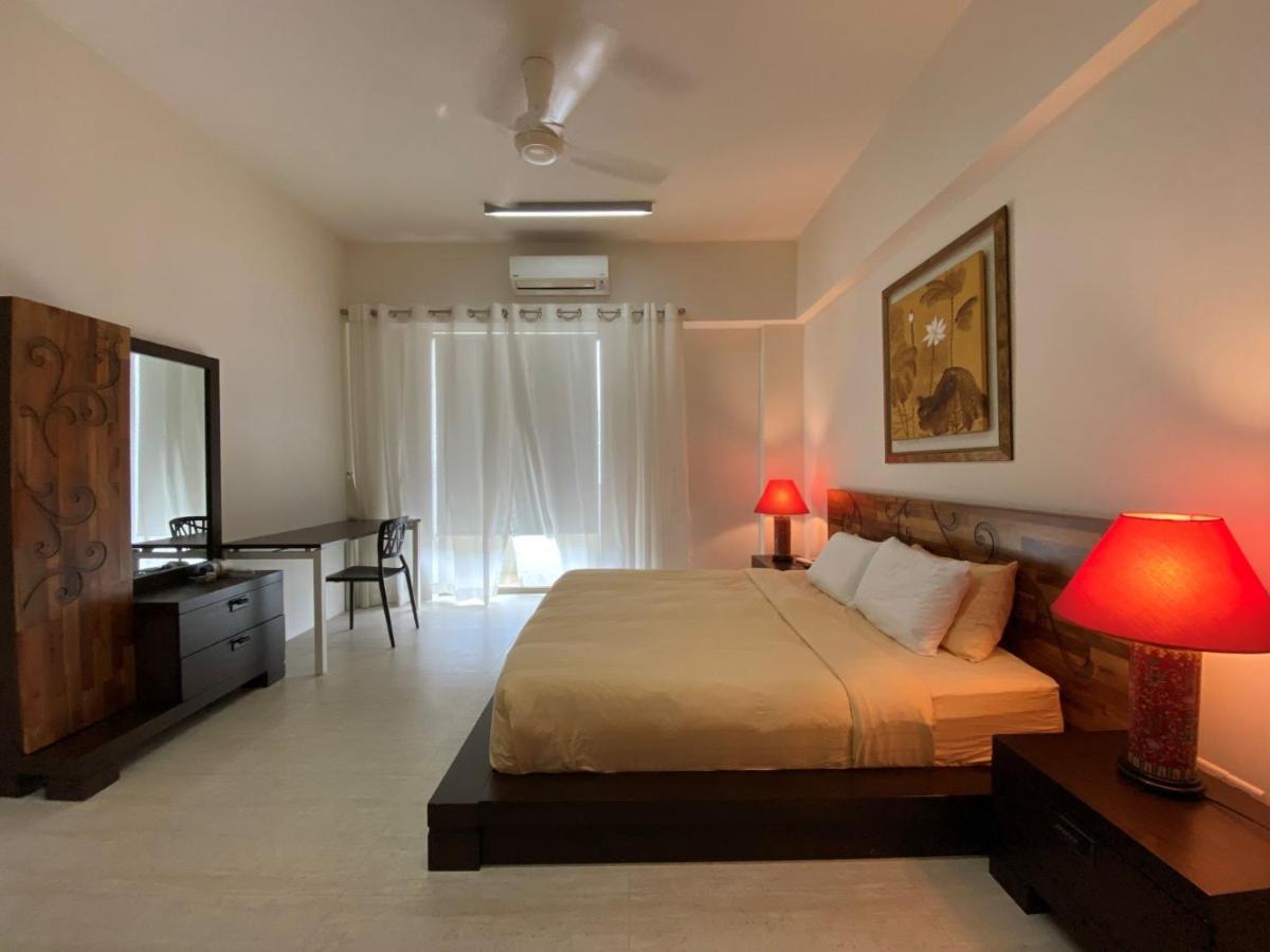 By The Sea@ Cozy Beachfront Home Batu Ferringhi Extérieur photo